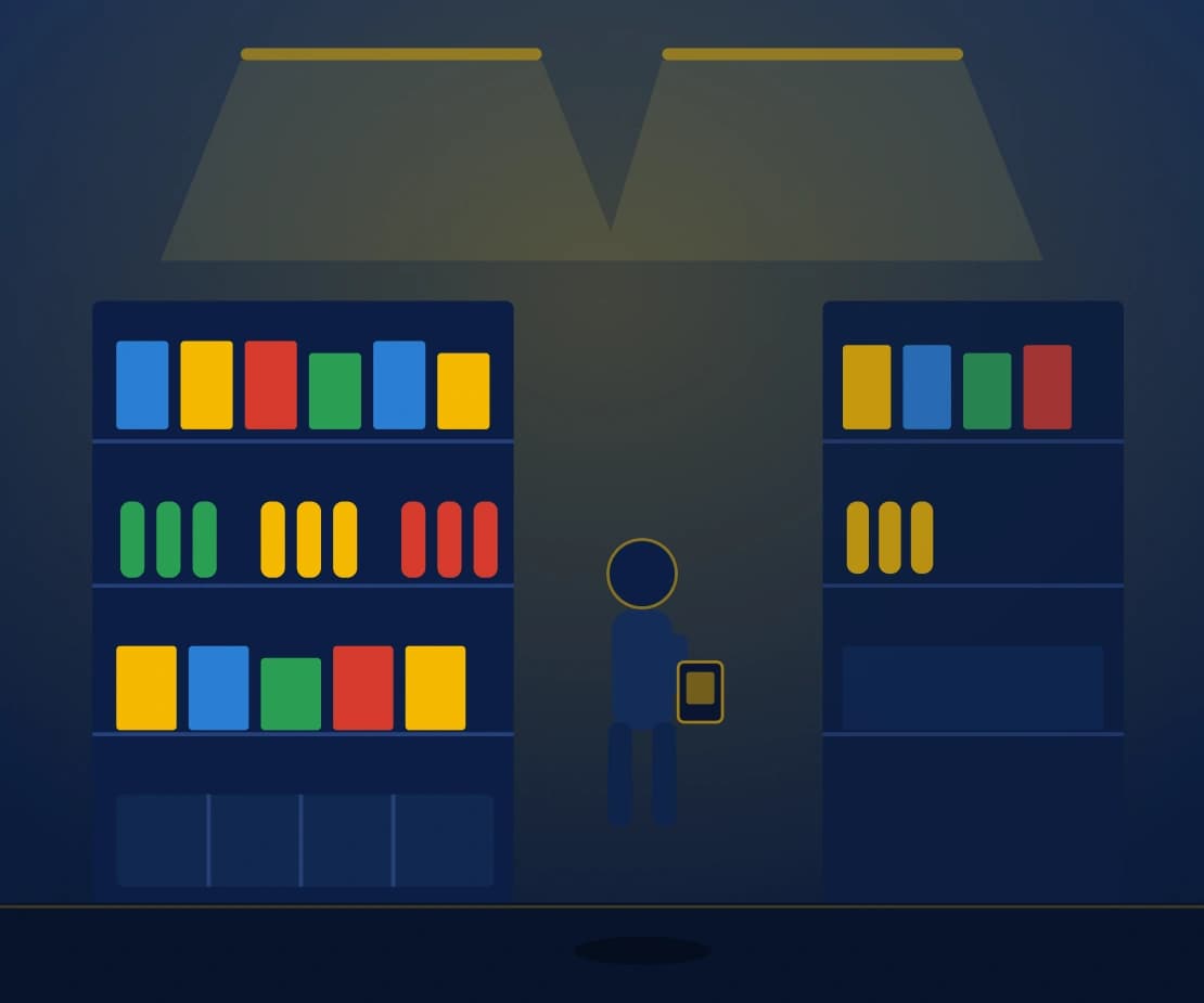 Warehouse aisle with a worker checking inventory on a tablet